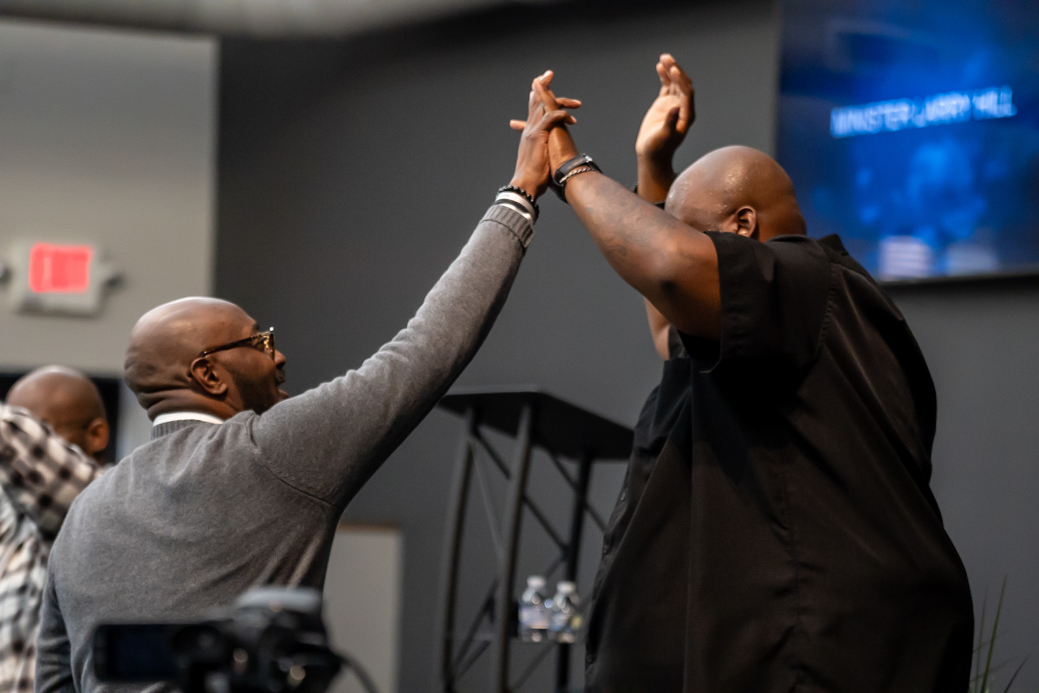 Men celebrating breakthrough and transformation together - brotherhood in action